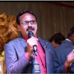 Bishop Iqbal Danish receiving certificate in Christian Leadership and Management from International Kingdom University USA